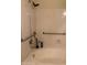 This bathtub features a shower and accessibility grab bars for comfort and safety at 5430 N 74Th Ave, Glendale, AZ 85303