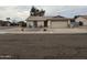 Charming single-story home with a two-car garage and xeriscaped front yard at 5430 N 74Th Ave, Glendale, AZ 85303