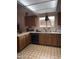 Functional kitchen featuring wood cabinets and ample counter space, ready for culinary creativity at 5430 N 74Th Ave, Glendale, AZ 85303