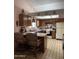 Charming kitchen features a breakfast bar, appliances, and ample cabinet space at 5430 N 74Th Ave, Glendale, AZ 85303