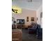 Cozy living room featuring plush seating, a ceiling fan and a television at 5430 N 74Th Ave, Glendale, AZ 85303
