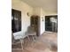 Cozy covered patio with tile flooring, perfect for enjoying the outdoors in comfort and style at 5430 N 74Th Ave, Glendale, AZ 85303