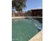 Sparkling pool with water feature and fenced surroundings, perfect for relaxation and fun at 5430 N 74Th Ave, Glendale, AZ 85303