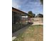 A view of the backyard area featuring a pool, iron fence and covered patio at 5430 N 74Th Ave, Glendale, AZ 85303