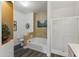 A bathroom with wood-look floors featuring a tub, a toilet, and a separate shower at 5450 E Mclellan Rd # 102, Mesa, AZ 85205