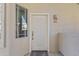 A welcoming front door with decorative details and a sidelight window for natural light at 5450 E Mclellan Rd # 102, Mesa, AZ 85205