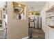 Open kitchen featuring stainless steel appliances, light cabinets, and stylish decor elements at 5450 E Mclellan Rd # 102, Mesa, AZ 85205