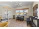 Inviting seating area near windows; features tables, chairs, and community information for residents at 5450 E Mclellan Rd # 102, Mesa, AZ 85205