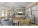 Comfortable lobby with stylish chairs, TV, and community information for a welcoming atmosphere at 5450 E Mclellan Rd # 102, Mesa, AZ 85205
