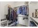 Well-organized walk-in closet with shelving and rods for ample storage and personal organization at 5450 E Mclellan Rd # 102, Mesa, AZ 85205