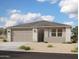 Charming single-story home with a two-car garage and neutral-toned exterior at 5639 W Summerside Rd, Laveen, AZ 85339