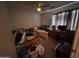 Bedroom with carpet, ceiling fan, dresser, window with blinds, and twin bed at 5684 S 237Th Dr, Buckeye, AZ 85326