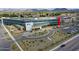 Aerial view of a large, modern hospital complex with parking and landscaped grounds at 6704 W Topeka Dr, Glendale, AZ 85308