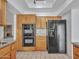 Kitchen with built in oven and refrigerator at 6704 W Topeka Dr, Glendale, AZ 85308