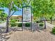 Community park rules sign surrounded by lush greenery and trees, ensuring a well-maintained environment at 6704 W Topeka Dr, Glendale, AZ 85308