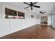 Bonus room features wood-look floors, white wainscoting, and a large window with backyard views at 6926 E Culver St, Scottsdale, AZ 85257