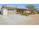 Charming single-story home with a spacious driveway and desert landscaping at 6926 E Culver St, Scottsdale, AZ 85257