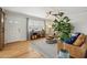 Bright living room featuring hardwood floors, stylish furnishings, and a cozy atmosphere at 6926 E Culver St, Scottsdale, AZ 85257