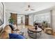 Inviting living room with hardwood floors, large sliding barn doors, and designer touches at 6926 E Culver St, Scottsdale, AZ 85257
