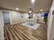 Bright dining area showcases modern decor, a sleek ceiling fan, and scenic outdoor views at 7316 W Carol Ave, Peoria, AZ 85345