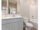 Bathroom featuring a single sink vanity, toilet, and bathtub at 7342 E Hackamore Ln, San Tan Valley, AZ 85143