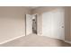 Bedroom with carpeted floor, closet and view to the kitchen at 7342 E Hackamore Ln, San Tan Valley, AZ 85143