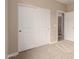 Bedroom featuring carpeted floors and sliding closet doors at 7342 E Hackamore Ln, San Tan Valley, AZ 85143