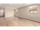 Open living area with tile floors, recessed lighting, and neutral paint; leads to other rooms at 7342 E Hackamore Ln, San Tan Valley, AZ 85143