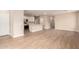 Open-concept living space with tile floors, neutral paint, and easy access to the kitchen at 7342 E Hackamore Ln, San Tan Valley, AZ 85143