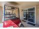 Covered patio shows a golf cart parked next to sliding glass doors at 7373 E Us Highway 60 -- # 108, Gold Canyon, AZ 85118