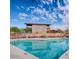 Enjoy a refreshing swim in this luxurious community pool under a sunny sky at 7373 E Us Highway 60 -- # 108, Gold Canyon, AZ 85118