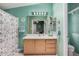 Bright bathroom with vanity, updated fixtures, and shower behind glass doors at 8500 E Southern Ave # 379, Mesa, AZ 85209