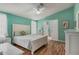 Cozy bedroom featuring a queen-sized bed with blue comforter, and ensuite bathroom at 8500 E Southern Ave # 379, Mesa, AZ 85209