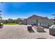 Inviting backyard patio with a cozy fire pit and comfortable seating, perfect for outdoor relaxation at 854 S Del Rio Ct, Apache Junction, AZ 85120