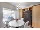 Dining area showcasing a wine rack, a round table, and seating for intimate gatherings at 854 S Del Rio Ct, Apache Junction, AZ 85120