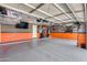 Spacious garage with organized storage and epoxy flooring, perfect for car enthusiasts at 854 S Del Rio Ct, Apache Junction, AZ 85120
