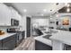 Beautiful kitchen featuring stainless steel appliances, grey cabinets and a contrasting white island countertop at 854 S Del Rio Ct, Apache Junction, AZ 85120