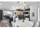Open floor plan connecting the kitchen, dining area, and living room for seamless entertaining at 854 S Del Rio Ct, Apache Junction, AZ 85120