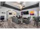Spacious living room with open floor plan, modern decor, and a ceiling fan at 854 S Del Rio Ct, Apache Junction, AZ 85120