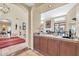 Open concept kitchen with stone countertops overlooks dining and living areas at 8935 E Larkspur Dr, Scottsdale, AZ 85260