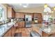 Gourmet kitchen with stainless steel appliances and granite countertops at 8935 E Larkspur Dr, Scottsdale, AZ 85260