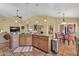Stylish kitchen island complements eat-in breakfast nook and overlooks the living area at 8935 E Larkspur Dr, Scottsdale, AZ 85260