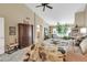 Spacious main bedroom with vaulted ceiling, sitting area, and ensuite bathroom at 8935 E Larkspur Dr, Scottsdale, AZ 85260