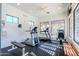 Bright community gym featuring a ceiling fan, workout machines, and lots of natural light at 9270 E Thompson Peak Pkwy # 381, Scottsdale, AZ 85255