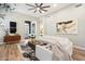 Comfortable living room with modern artwork, a ceiling fan, and lots of natural light at 9270 E Thompson Peak Pkwy # 381, Scottsdale, AZ 85255