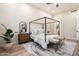 Serene main bedroom with a canopy bed, modern decor, and lots of natural light at 9270 E Thompson Peak Pkwy # 381, Scottsdale, AZ 85255