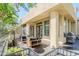 Covered outdoor living space with patio furniture and grill at 9270 E Thompson Peak Pkwy # 381, Scottsdale, AZ 85255