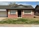 Charming single-story home features a brick facade, well-maintained lawn, and a cozy front entrance at 9638 W Cinnabar Ave # B, Peoria, AZ 85345