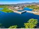 An aerial view of a golf course, a pond and the homes in the community at 11878 N Hershey St, Surprise, AZ 85388