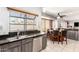 Eat-in kitchen includes stainless dishwasher, breakfast nook with a view to the backyard at 1401 E Brentrup Dr, Tempe, AZ 85283
